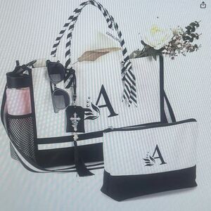 Canvas Initial  Bags comes with strap and Initial Make up bag.